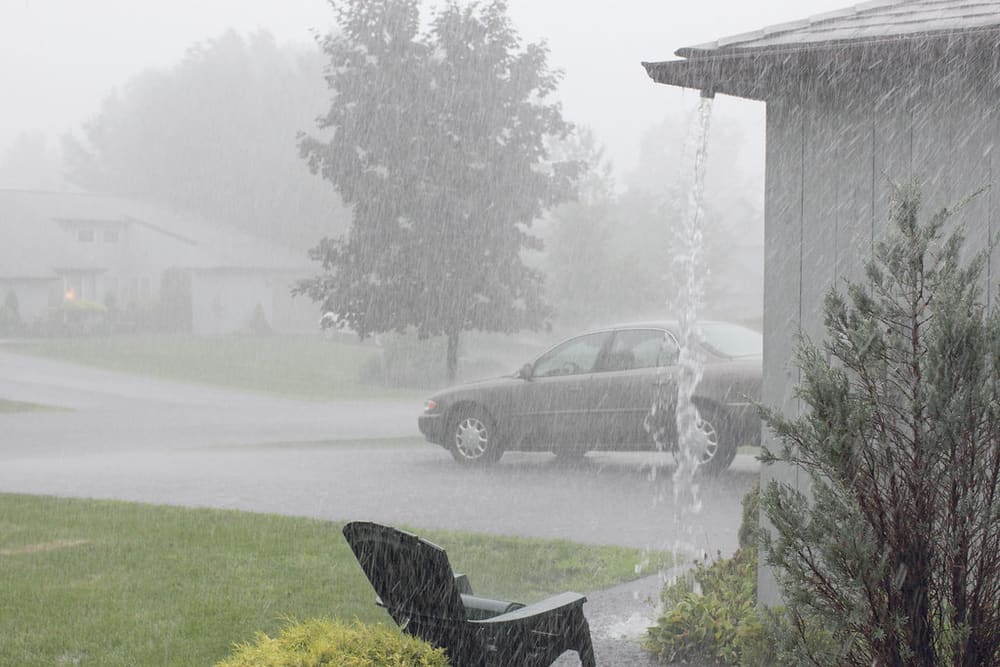 Downspout moving water during heavy rain